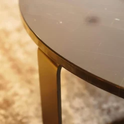 Draenert Couchtische|Couchtisch 1062 Primus Platte Stein Sahara Noir Schwarz Mit Dunkelbronzenen Akzenten Rund Poliert