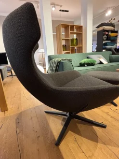 Leolux Loungesessel|Sessel Caruzzo Plus Stoff Apollo Dunkelgrau Braun Drehgestell Schwarz Lackiert Inklusive Hocker